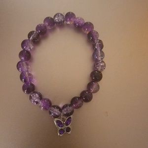 Purple and white beaded bracelet(with butterfly)